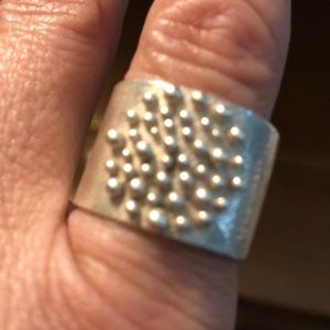 Sterling silver beaded and etched band.